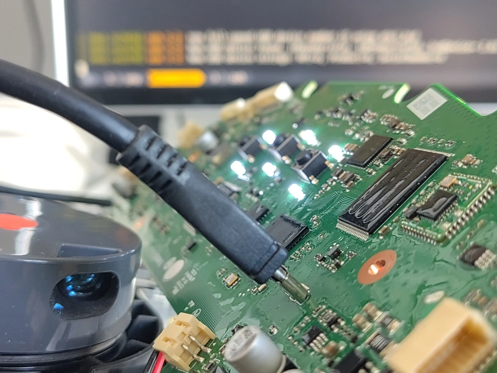 Robot vacuum in the process of being rooted